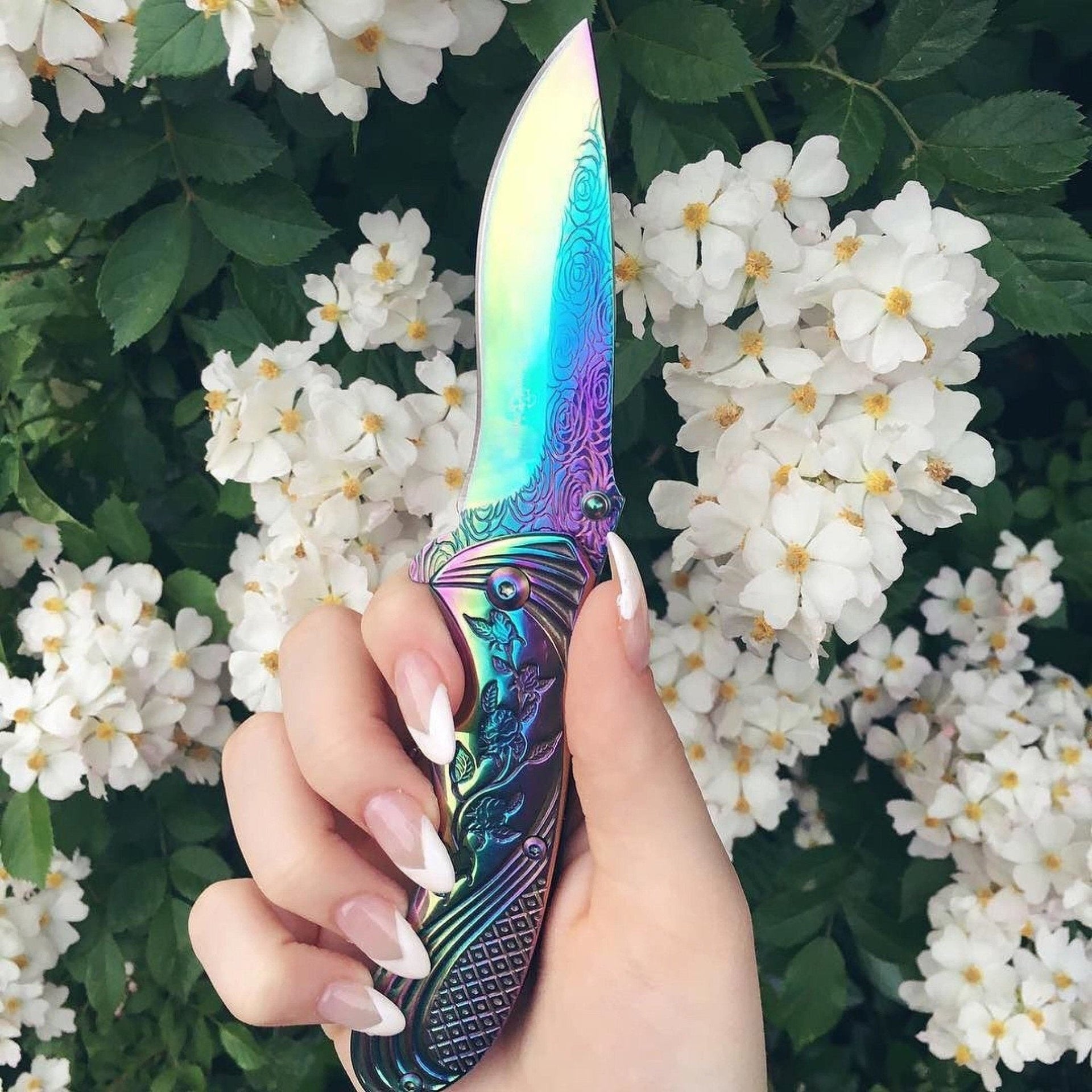 https://www.bladesforbabes.com/cdn/shop/products/rainbow-rose-knife-991251.jpg?v=1655489418&width=1920